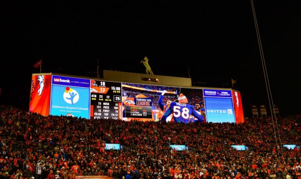 DENVER, CO - DECEMBER 15:  The scoreboard acknowledges outside linebacker Von Miller #58 of the Den...