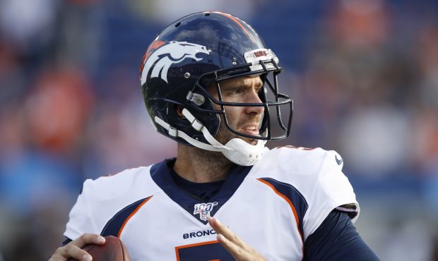CANTON, OH - AUGUST 01: Joe Flacco #5 of the Denver Broncos warms up before a preseason game agains...