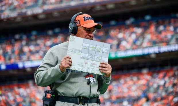 DENVER, CO - SEPTEMBER 15: Head coach Vic Fangio of the Denver Broncos walks alone the sideline in ...