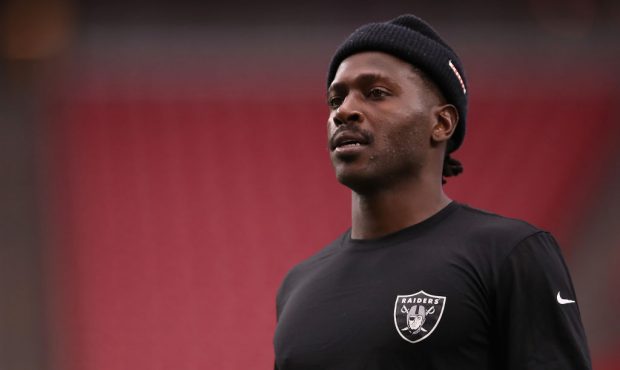 Wide receiver Antonio Brown #84 of the Oakland Raiders warms up before the NFL preseason game again...