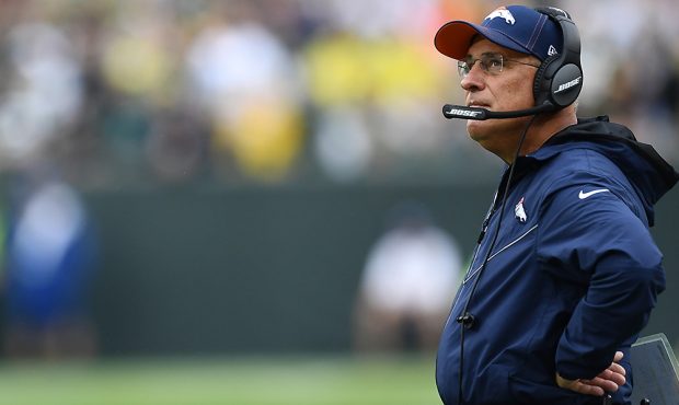 GREEN BAY, WISCONSIN - SEPTEMBER 22: Head coach Vic Fangio of the Denver Broncos watches action dur...