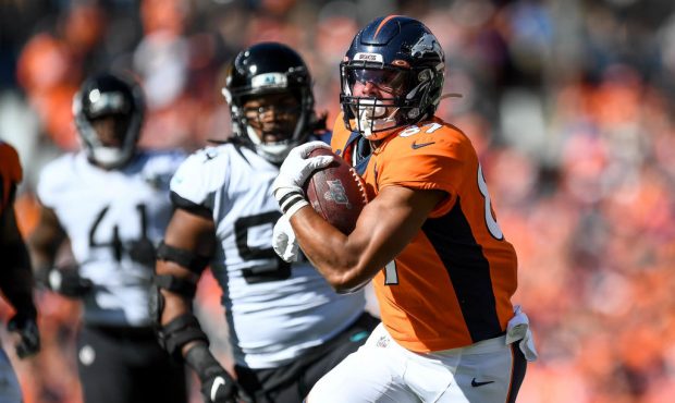 DENVER, CO - SEPTEMBER 29:  Noah Fant #87 of the Denver Broncos runs before scoring a first quarter...