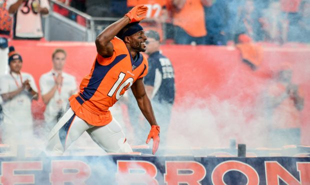 DENVER, CO - OCTOBER 17: Emmanuel Sanders #10 of the Denver Broncos runs onto the field during play...