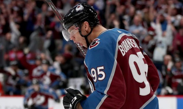 DENVER, COLORADO - OCTOBER 12: Andre Burakovsky #95 of the Colorado Avalanche celebrates scoring th...