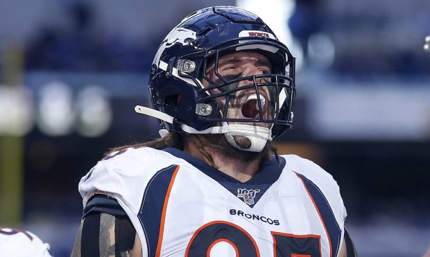 INDIANAPOLIS, INDIANA - OCTOBER 27: Derek Wolfe #95 of the Denver Broncos celebrates after a play i...