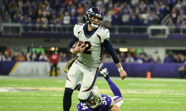 MINNEAPOLIS, MN - NOVEMBER 17: Brandon Allen #2 of the Denver Broncos runs with the ball in the fou...