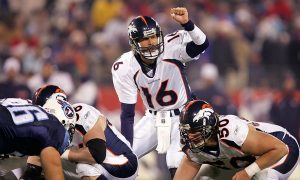 NASHVILLE, TN - DECEMBER 25: Jake Plummer #16 of the Denver Broncos calls a play at the line of scrimmage during their game against the Tennessee Titans on December 25, 2004 at The Coliseum in Nashville, Tennessee. (Photo by Streeter Lecka/Getty Images)