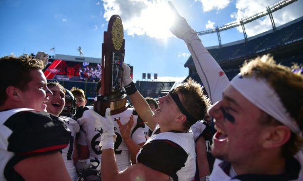 DENVER, CO - DECEMBER 1: Loveland football players celebrate winning of Class 4A state football cha...