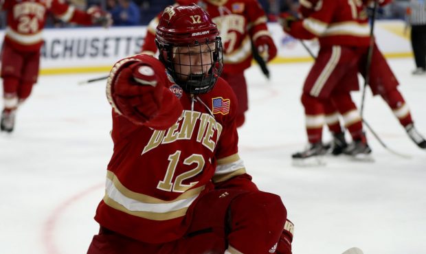 BUFFALO, NEW YORK - APRIL 11: Kohen Olischefski #12 of the Denver Pioneers celebrates his goal in t...