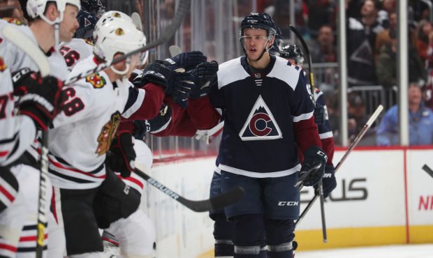 Mikko Rantanen #96 of the Colorado Avalanche celebrates with his bench after scoring a goal against...
