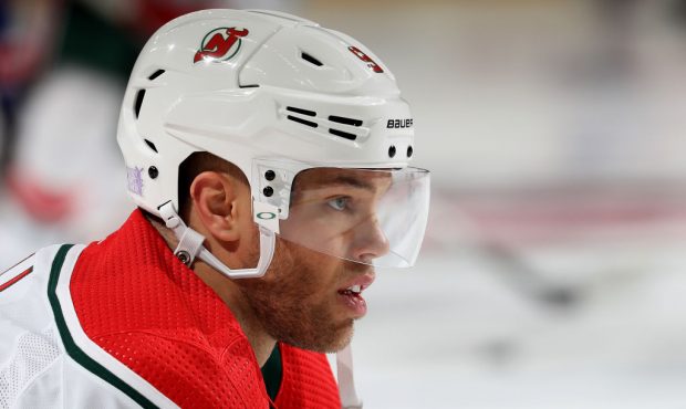 NEWARK, NEW JERSEY - NOVEMBER 30: Taylor Hall #9 of the New Jersey Devils stretches during warm ups...