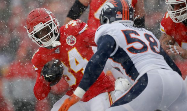KANSAS CITY, MISSOURI - DECEMBER 15: Darwin Thompson #34 of the Kansas City Chiefs rushes with the ...