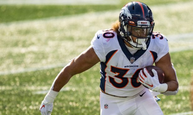 FOXBOROUGH, MA - OCTOBER 18: Phillip Lindsay #30 of the Denver Broncos carries the ball during the ...