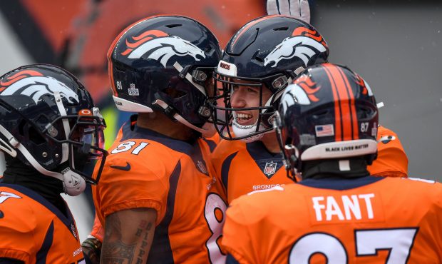 DENVER, CO - OCTOBER 25: Drew Lock #3 of the Denver Broncos smiles as he celebrates a first quarter...