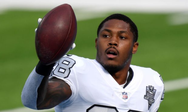 Josh Jacobs #28 of the Las Vegas Raiders during warm up before the game against the Los Angeles Cha...