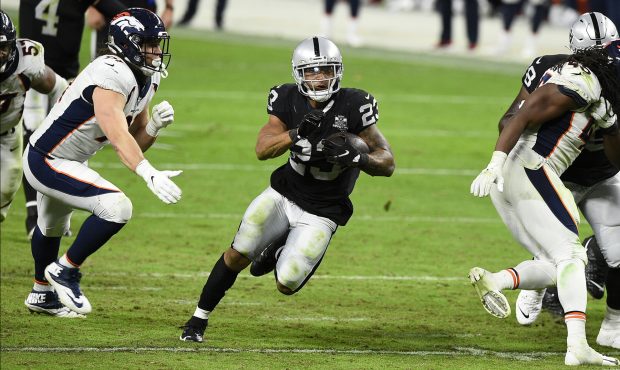 LAS VEGAS, NEVADA - NOVEMBER 15: Running back Devontae Booker #23 of the Las Vegas Raiders runs for...