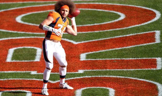 DENVER, COLORADO - NOVEMBER 29: Phillip Lindsay #30 of the Denver Broncos warms up prior to facing ...