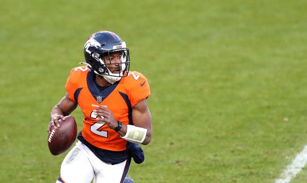 DENVER, COLORADO - NOVEMBER 29: Kendall Hinton #2 of the Denver Broncos looks to pass during the th...