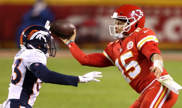 KANSAS CITY, MISSOURI - DECEMBER 06: Patrick Mahomes #15 of the Kansas City Chiefs throws under pre...