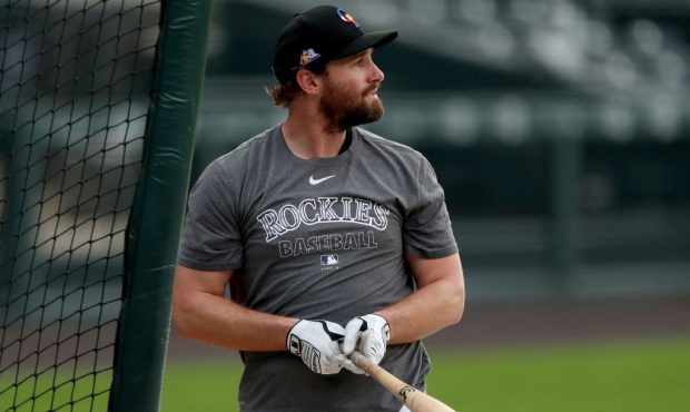DENVER, COLORADO - JULY 09: Daniel Murphy of the Colorado Rockies bats during summer workouts at Co...