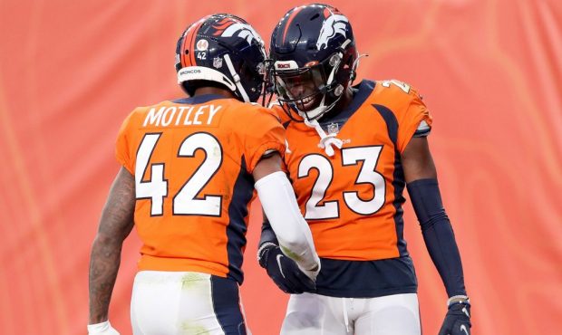 DENVER, COLORADO - JANUARY 03: Michael Ojemudia #23 of the Denver Broncos celebrates with Parnell M...