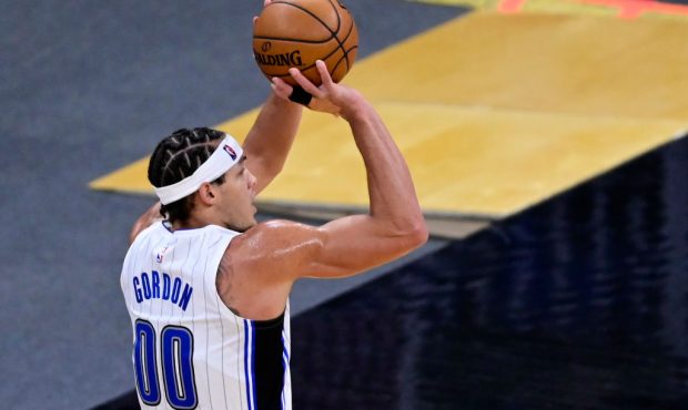 ORLANDO, FLORIDA - JANUARY 04: Aaron Gordon #00 of the Orlando Magic shoots a three pointer during ...