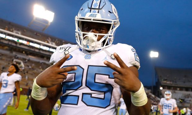 ATLANTA, GEORGIA - OCTOBER 05: Javonte Williams #25 of the North Carolina Tar Heels reacts after th...