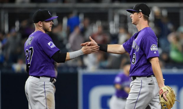 SAN DIEGO, CA - SEPTEMBER 1: Trevor Story #27 of the Colorado Rockies, left, and DJ LeMahieu #9 hig...