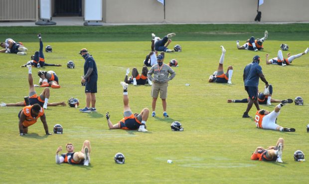 ENGLEWOOD, CO - AUGUST 16: Head coach Vic Fangio of the Denver Broncos walks on the field as player...