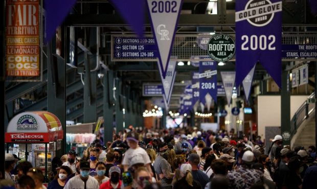 DENVER, CO - APRIL 4: A general view of fans walking not the concourse as the Los Angeles Dodgers t...