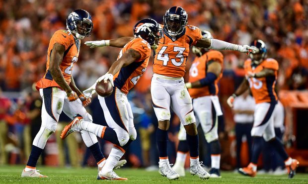 DENVER, CO - SEPTEMBER 8: Strong safety T.J. Ward #43 and cornerback Aqib Talib #21 of the Denver B...