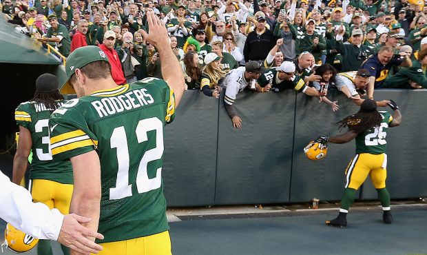 GREEN BAY, WI - SEPTEMBER 14: Quarterback Aaron Rodgers #12 of the Green Bay Packers waves to fans ...