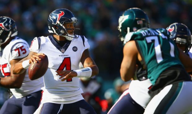 PHILADELPHIA, PA - DECEMBER 23: Quarterback Deshaun Watson #4 of the Houston Texans looks to pass a...