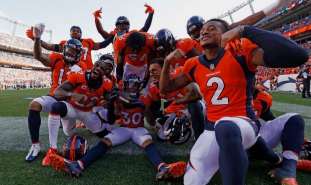 DENVER, COLORADO - SEPTEMBER 26: Caden Sterns #30 of the Denver Broncos celebrates his interception...