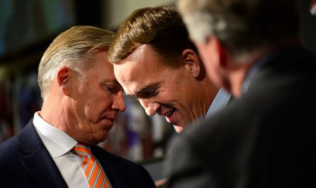 ENGLEWOOD, CO - MARCH 07: Denver Broncos former quarterback John Elway with Peyton Manning during a...