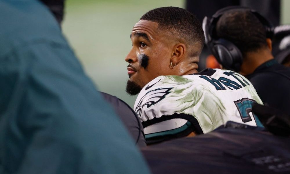 GLENDALE, ARIZONA - DECEMBER 20: Quarterback Jalen Hurts #2 of the Philadelphia Eagles looks up fro...