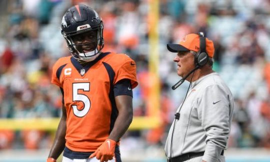 JACKSONVILLE , FL - SEPTEMBER 19: Head coach Vic Fangio of the Denver Broncos and Teddy Bridgewater...