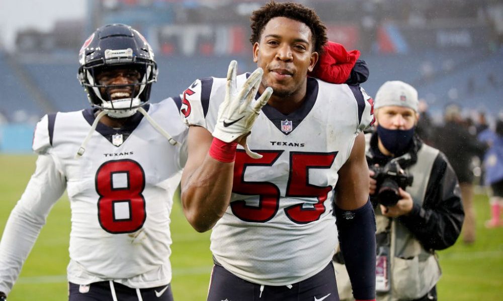 NASHVILLE, TENNESSEE - NOVEMBER 21: Terrence Brooks #8 and DeMarcus Walker #55 of the Houston Texan...
