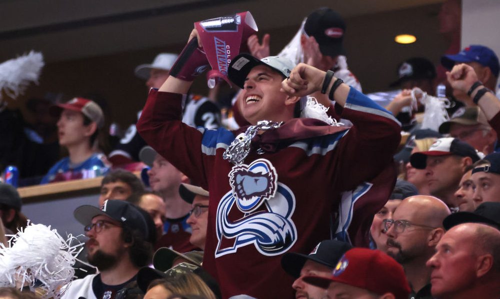 A fan cheers...