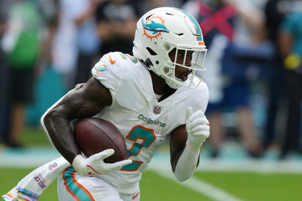 MIAMI GARDENS, FLORIDA - OCTOBER 16: Chase Edmonds #2 of the Miami Dolphins rushes during the secon...