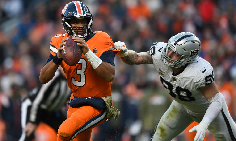 Maxx Crosby sacks Russell Wilson...