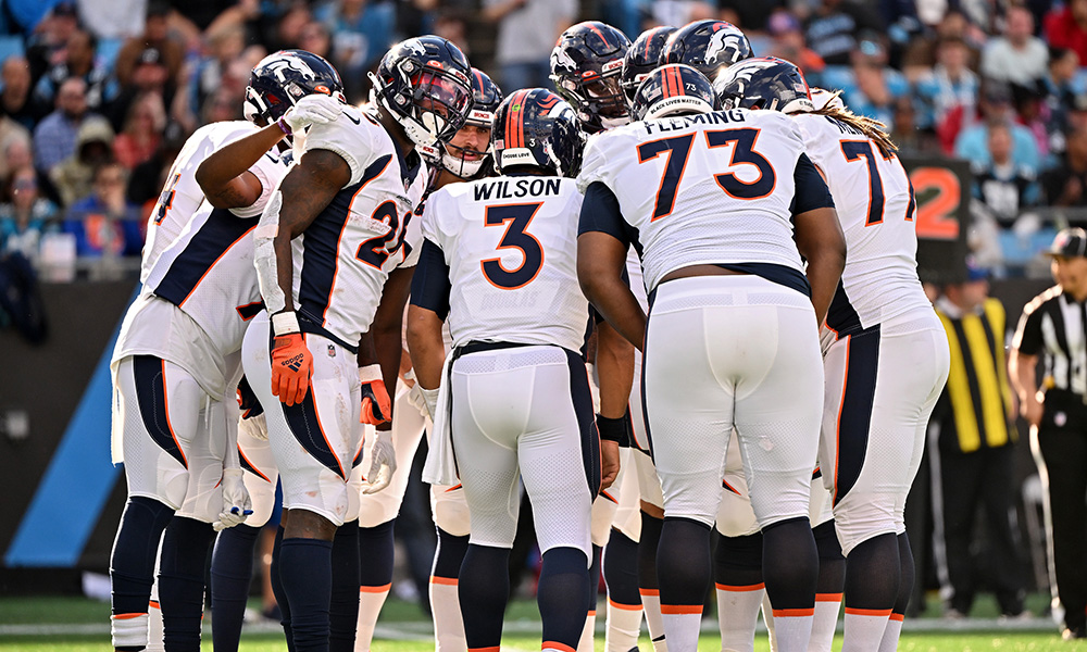 Russell Wilson in the huddle...