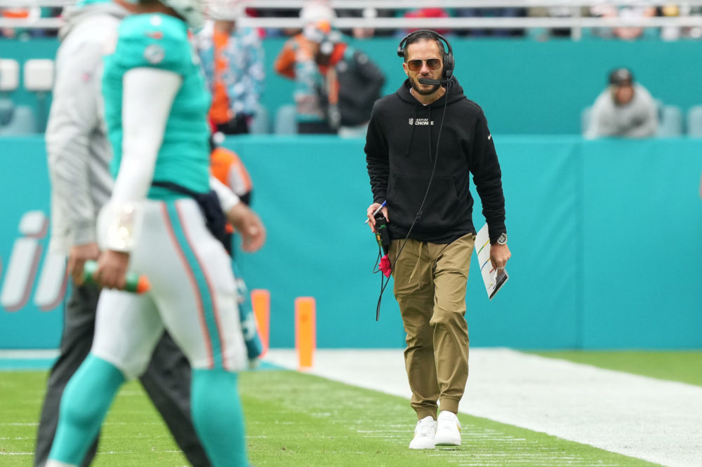 MIAMI GARDENS, FLORIDA - DECEMBER 25: Head coach Mike McDaniel of the Miami Dolphins looks on durin...
