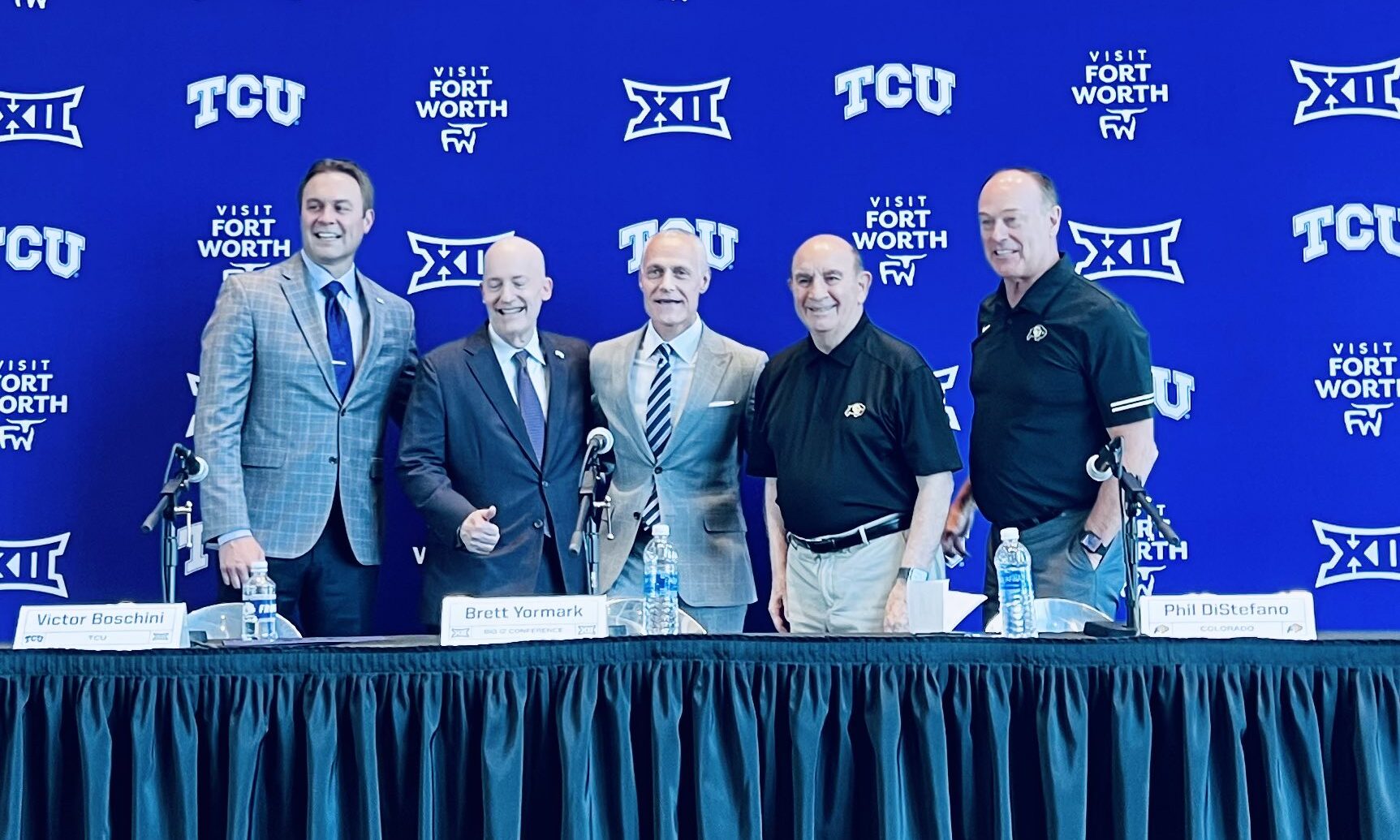 TCU's Jeremiah Donati and Victor Boschini, Big-12 boss Brett Yormark and Colorado's Phil DiStefano ...