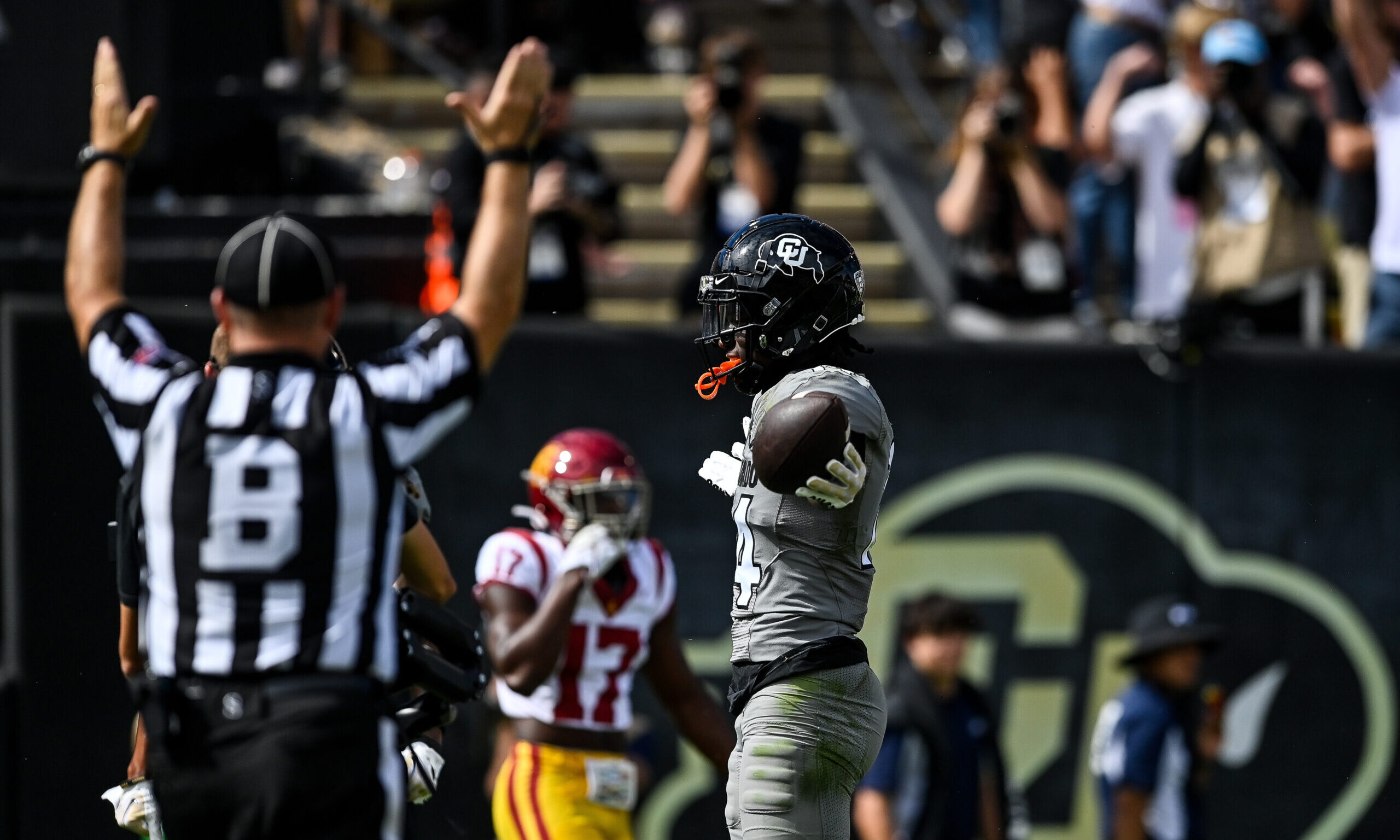 Omarion Miller #14 of the Colorado Buffaloes...