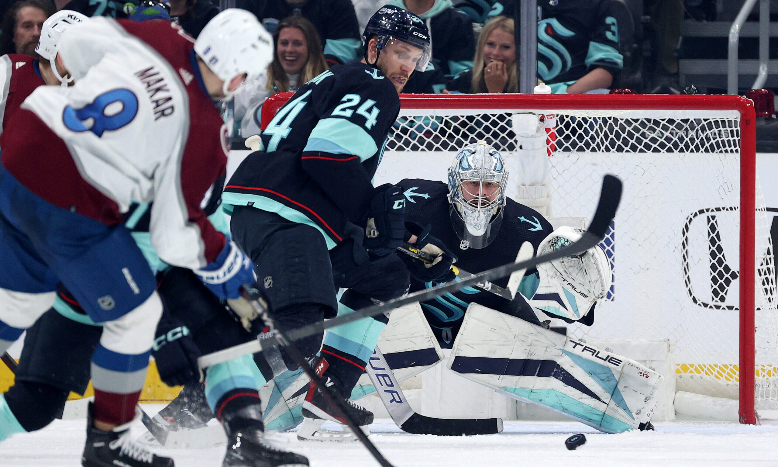 SEATTLE, WASHINGTON - APRIL 28: Philipp Grubauer #31 of the Seattle Kraken tends net as Cale Makar ...