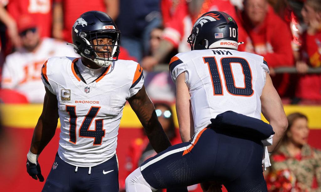 Courtland Sutton #14 and Bo Nix #10 of the Denver Broncos...