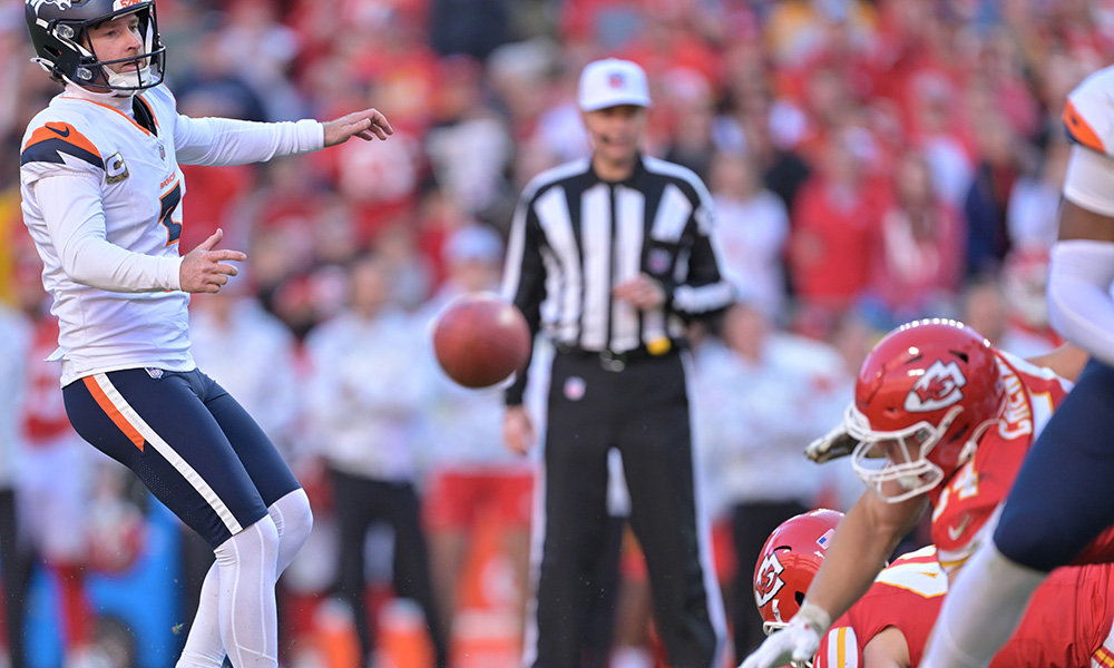 Broncos kicker Wil Lutz watches the blocked field goal...